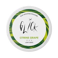 Detail close-up of the Citrine Grape pouch showing its round container, label design, and brand logo against a white backg…