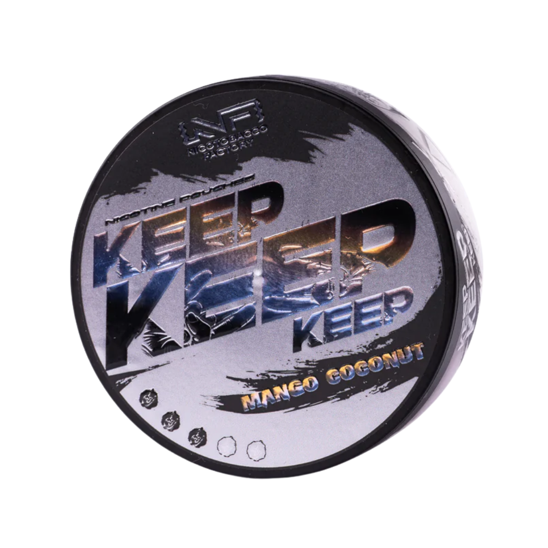 Detail close-up of Keep Mango Coconut nicotine pouch packaging featuring a round container and bold text on a white backgr…