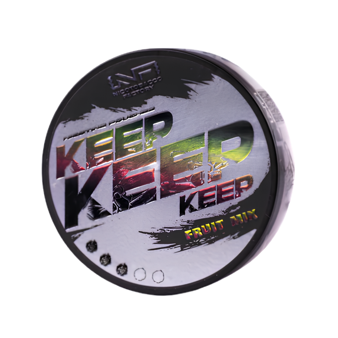 Detail close-up of a circular black and white container featuring text design and label details for Keep Fruit Mix.