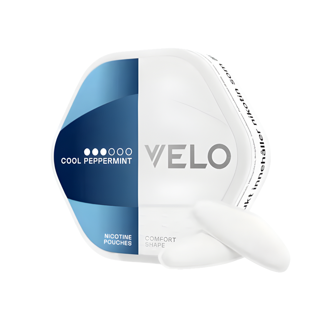 Packaging of VELO Shift Cool Peppermint snus can, featuring a hexagonal shape in white and blue with brand logo.