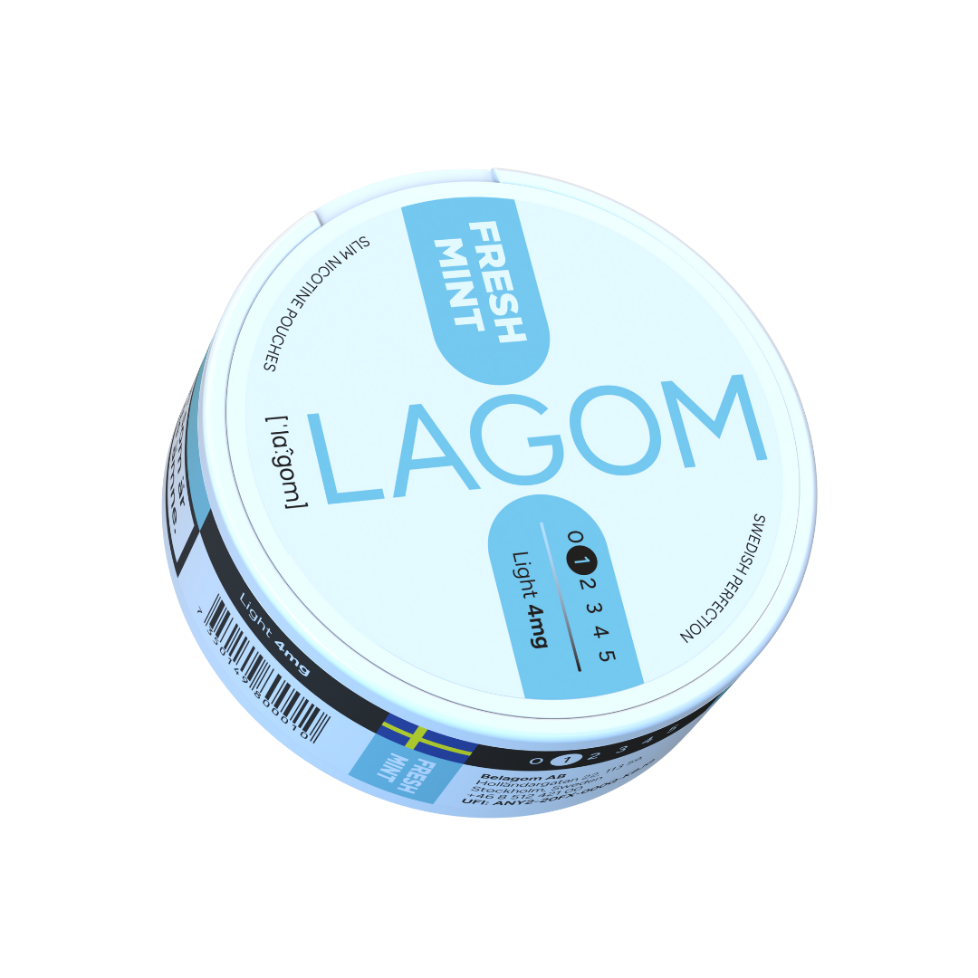 Detail close-up of Lagom Fresh Mint pouches in a round container, featuring light blue and white colors.