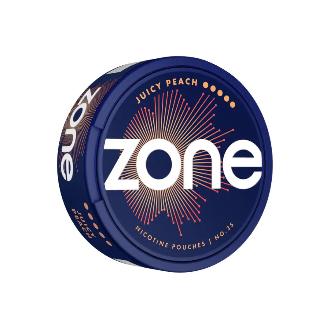 Close-up of Zone Juicy Peach Ultra e-liquid bottle showing the label and peach flavor branding.