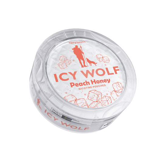 Detail close-up of the Icy Wolf Peach Honey pouch in a transparent container with decorative design, featuring red and whi…