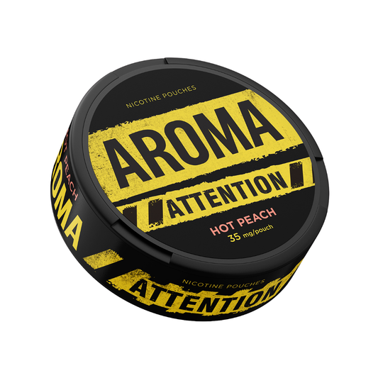Detail close-up of the black can featuring bold text and a circular label design with peach color accents.