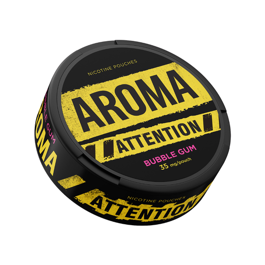 Detail close-up of a black can featuring bold yellow text and a circular label design.
