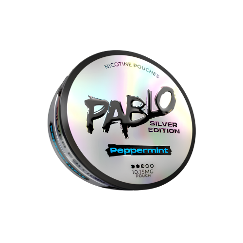 Detail close-up of the silver and black peppermint snus packaging featuring a holographic finish.