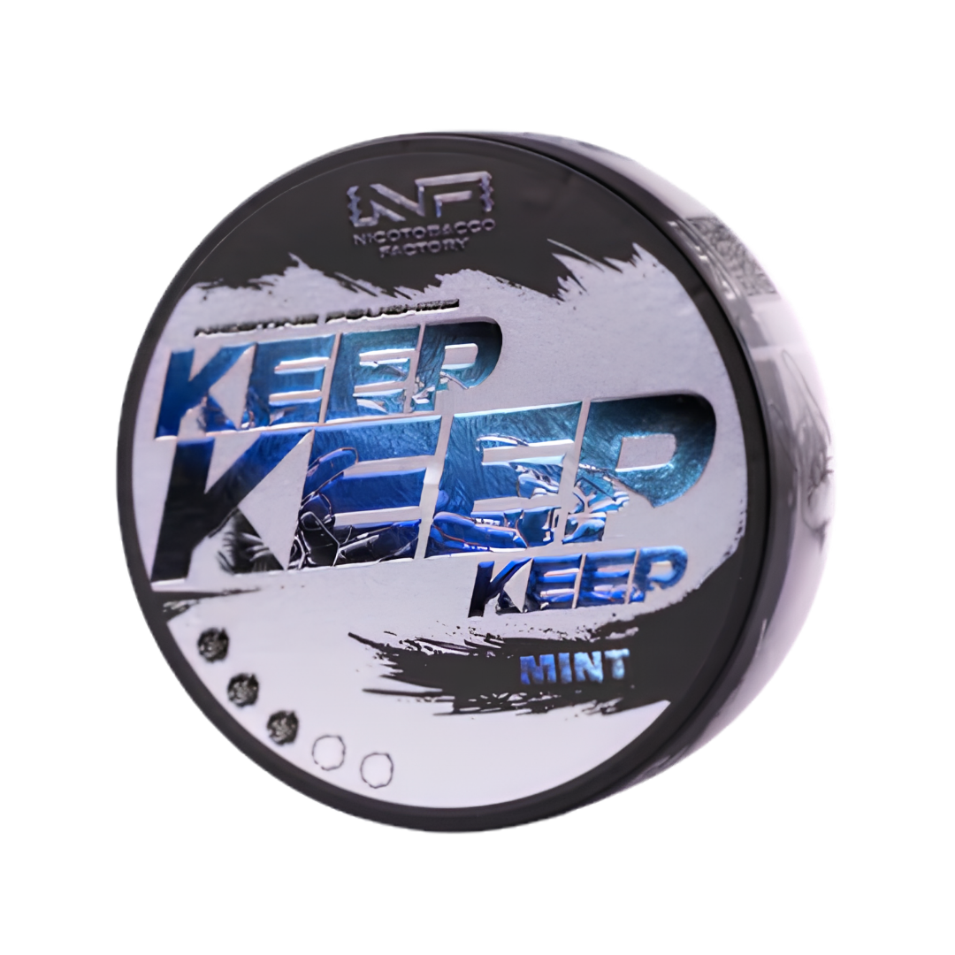 Front view of the Keep Mint nicotine pouch packaging with bold text and a circular black, blue, and white container.