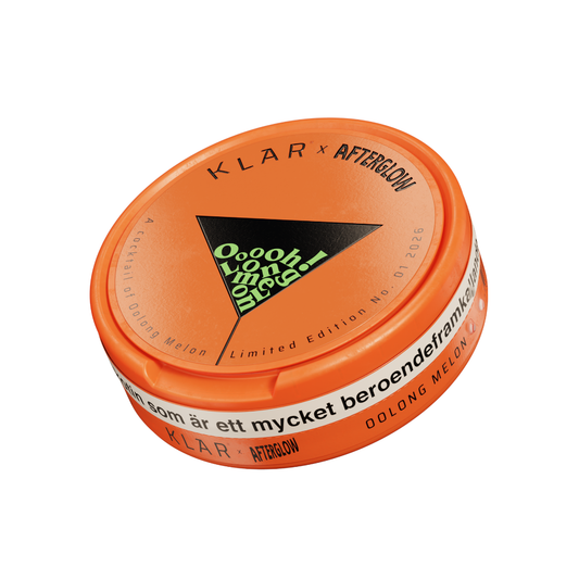 Detail close-up of the orange container with a transparent lid featuring a triangle design on a white background