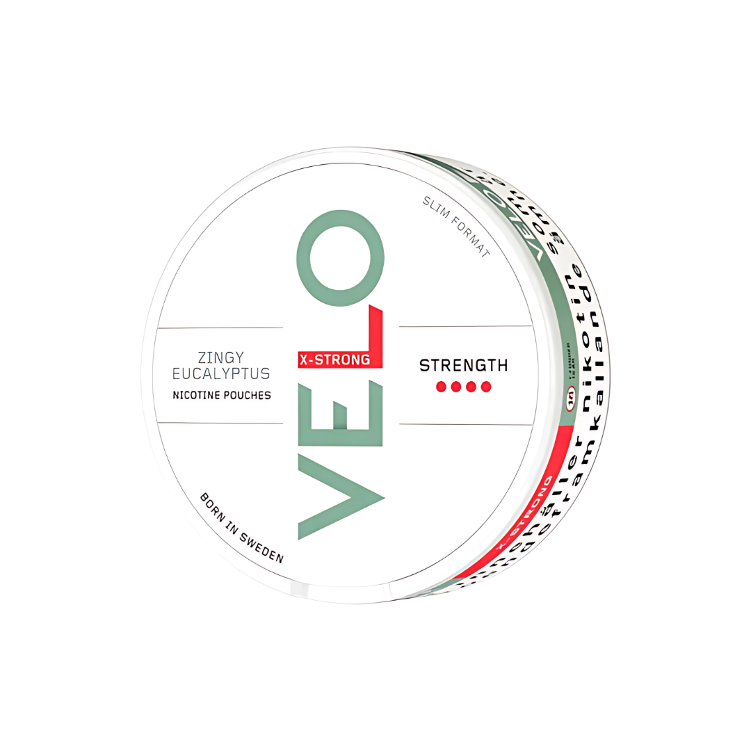 Detail close-up of a circular snus can featuring the Velo Zingy Eucalyptus flavor label in white, green, and red colors.
