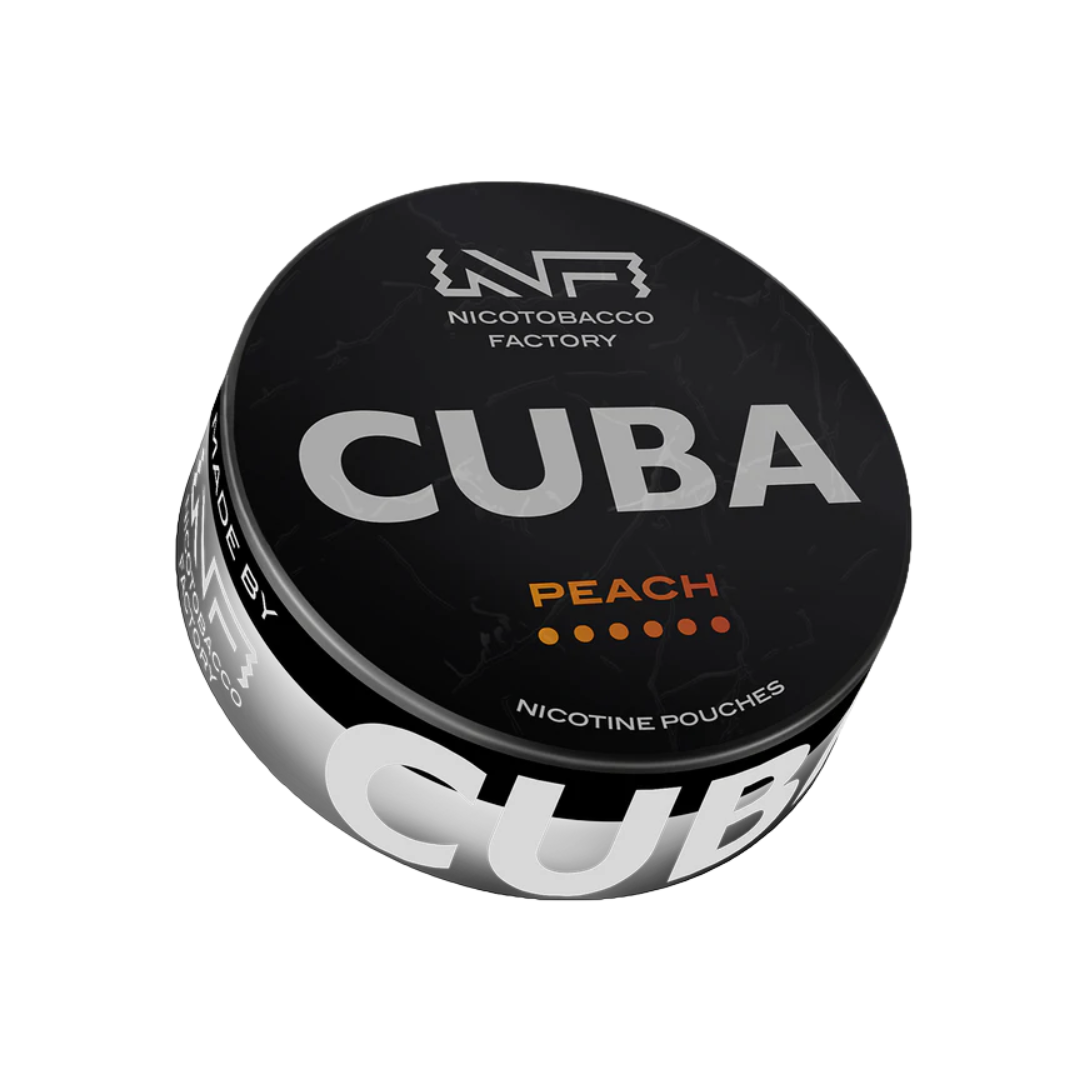 Detail close-up of Cuba Black Peach nicotine pouch in a round tin, showcasing the peach flavor label.
