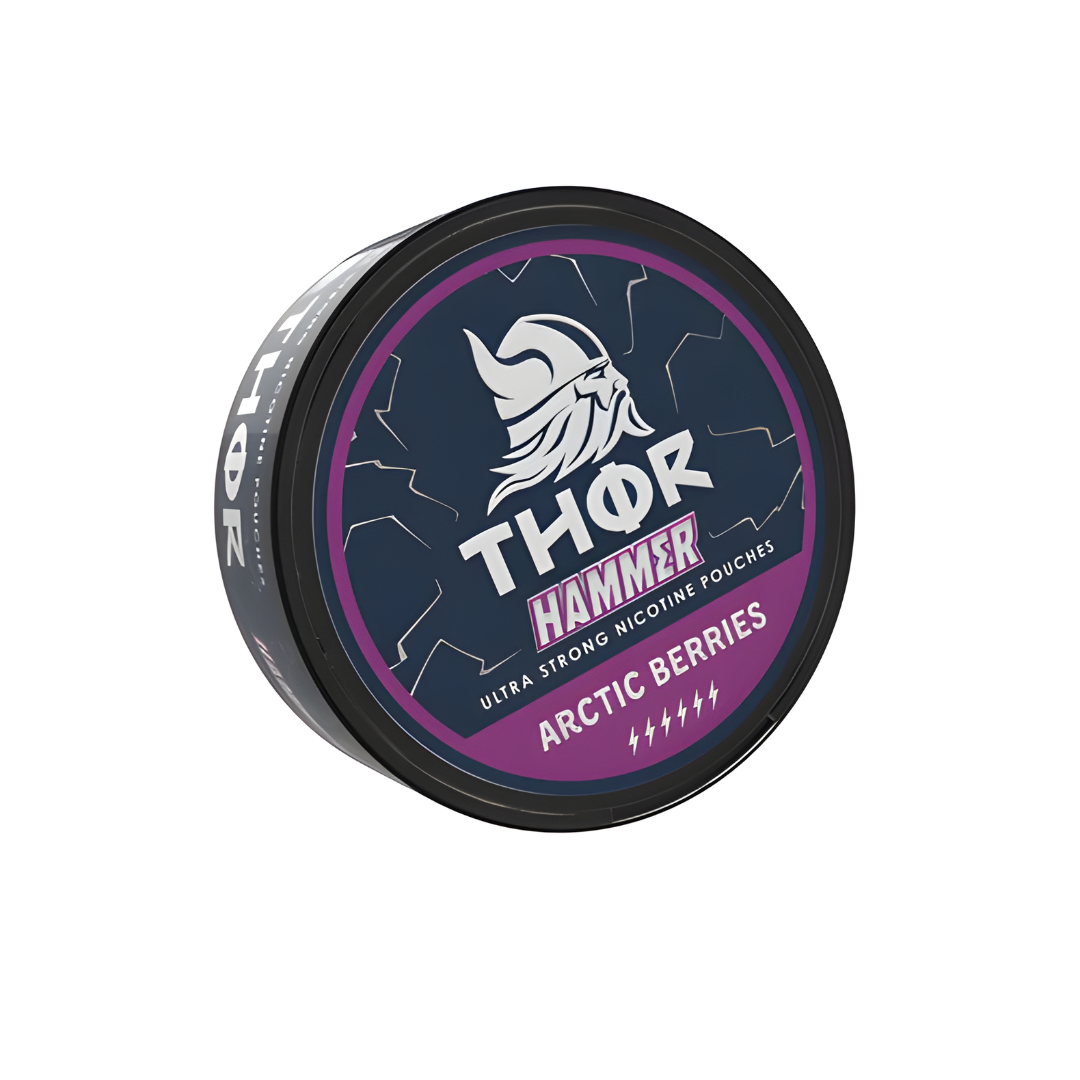 Detail close-up of Thor Hammer Arctic Berries nicotine pouch in a circular container with a logo on the lid, featuring bla…