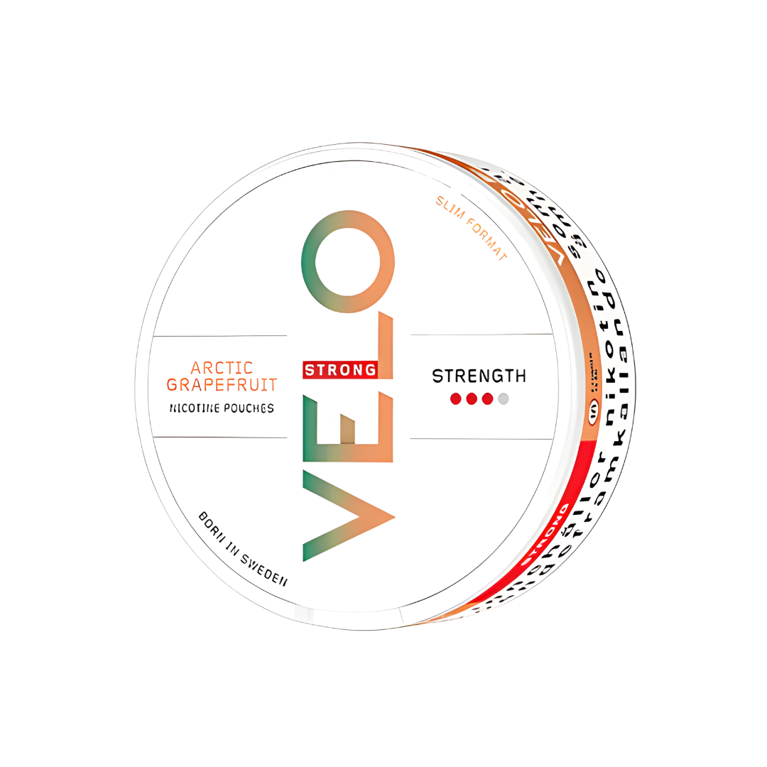 Detail close-up of the circular snus can featuring white, orange, and green colors with flavor label and brand logo