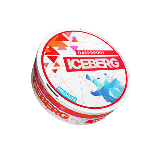 Front view of a colorful Iceberg Raspberry snus container featuring a circular shape, vibrant red and blue design on a whi…