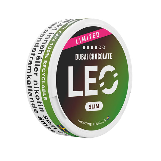 Detail close-up of the circular snus can showcasing the Leo Dubai Chocolate flavor label in green, black, white, and pink.