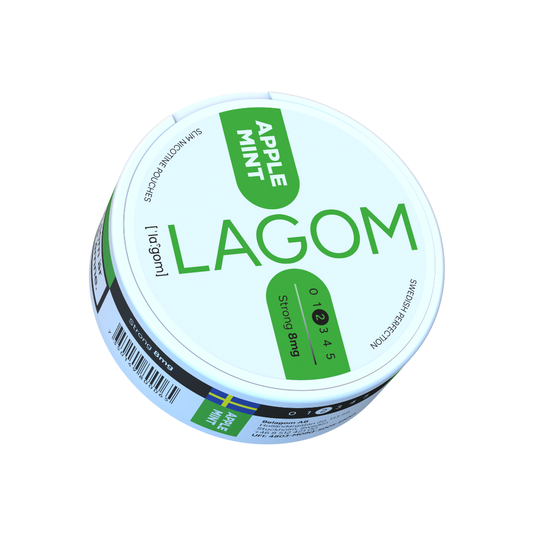 Detail close-up of Lagom Apple Mint nicotine pouch in a circular container with a green label.