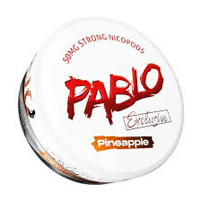 Round red and white container of Pablo Exclusive Pineapple with screw top, viewed from the front on a transparent background.