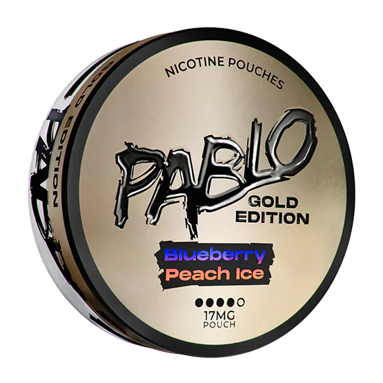 Front view of Pablo Gold Edition in a round tin featuring gold, black, blue, and peach colors with bold text.