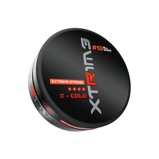 Detail close-up of Xtrime X-Cold snus packaging featuring black, red, and white colors.