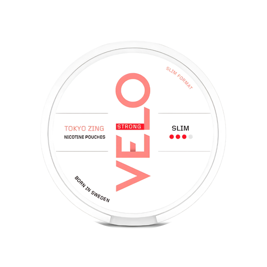 Detail close-up of a circular white and red snus container featuring a minimalist design and brand name.