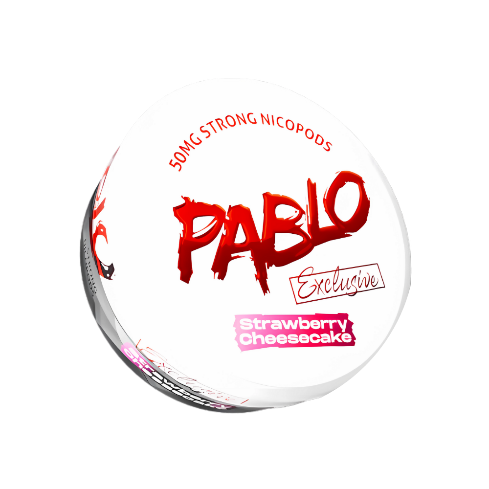 Front view of the Pablo Exclusive Strawberry Cheesecake snus in a round container featuring bold red and pink text on a tr…
