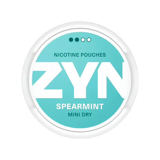 Detail close-up of the ZYN spearmint pouch in a round teal container with a white label.