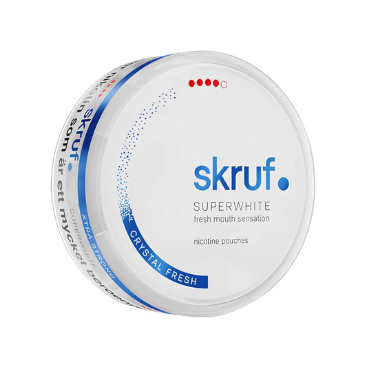 Skruf Superwhite Crystal Fresh Xtra Strong snus pouch with white tobacco and fresh mint flavor in a silver tin.