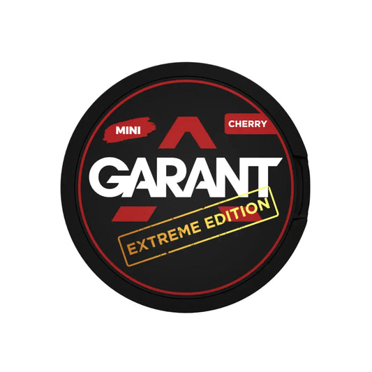 Close-up of Garant Extreme Cherry Mini e-liquid bottle showing the label and cherry flavor branding.