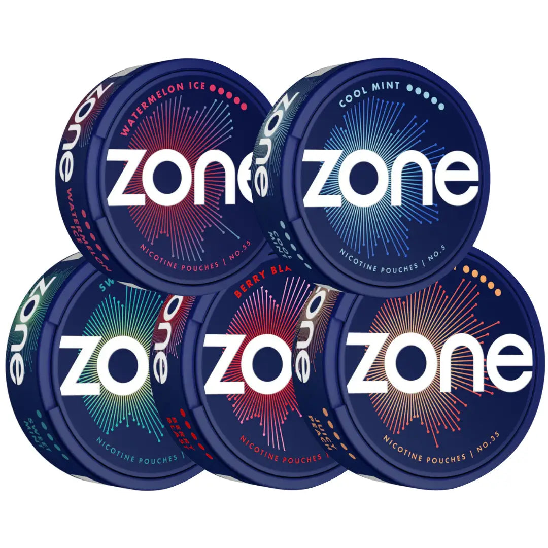 European Zone Mixpack featuring a variety of scented candles in colorful packaging, arranged in a cardboard box.
