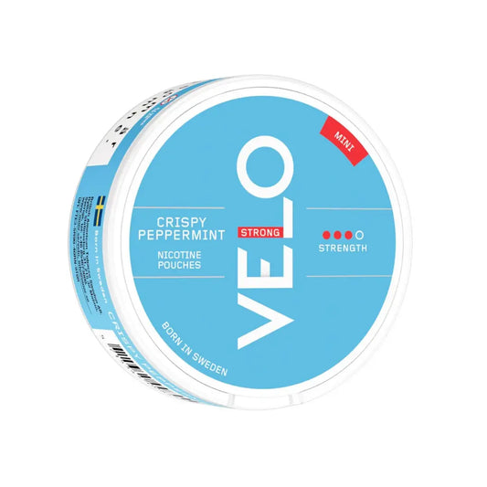 Velo Crispy Peppermint Mini candies in colorful packaging, made by NikoPouches.dk, displayed in a close-up shot.